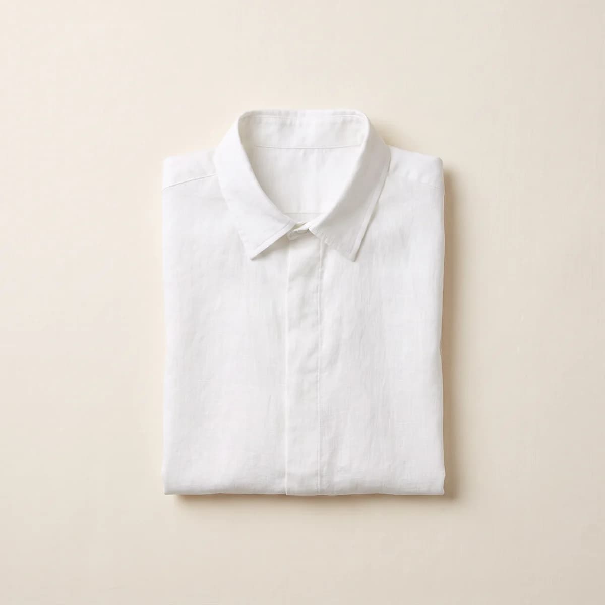 Folded white linen shirt